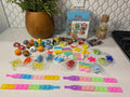 Kids Party Favors Toy Set with Assorted Mini Toys and Pop It Bracelets