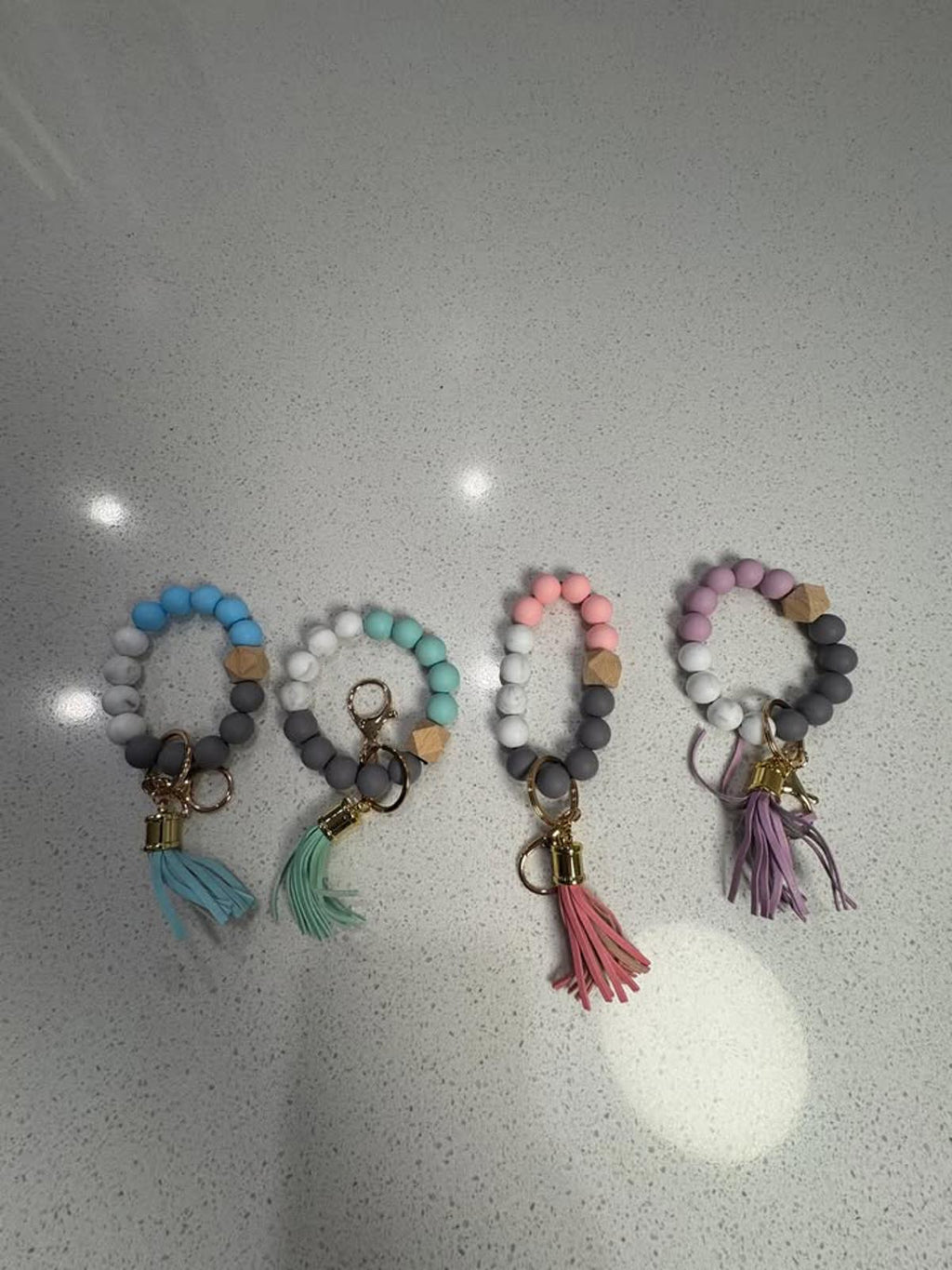 Set of Four Silicone Beaded Keychain Bracelets with Tassels