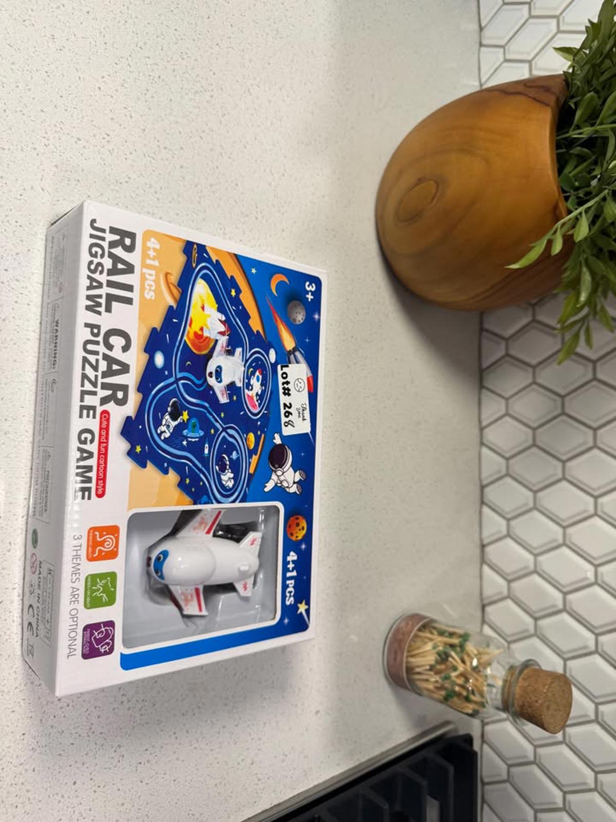 Rail Car Jigsaw Puzzle Game with Space and Ocean Themes