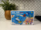 Rail Car Jigsaw Puzzle Game with Space and Ocean Themes
