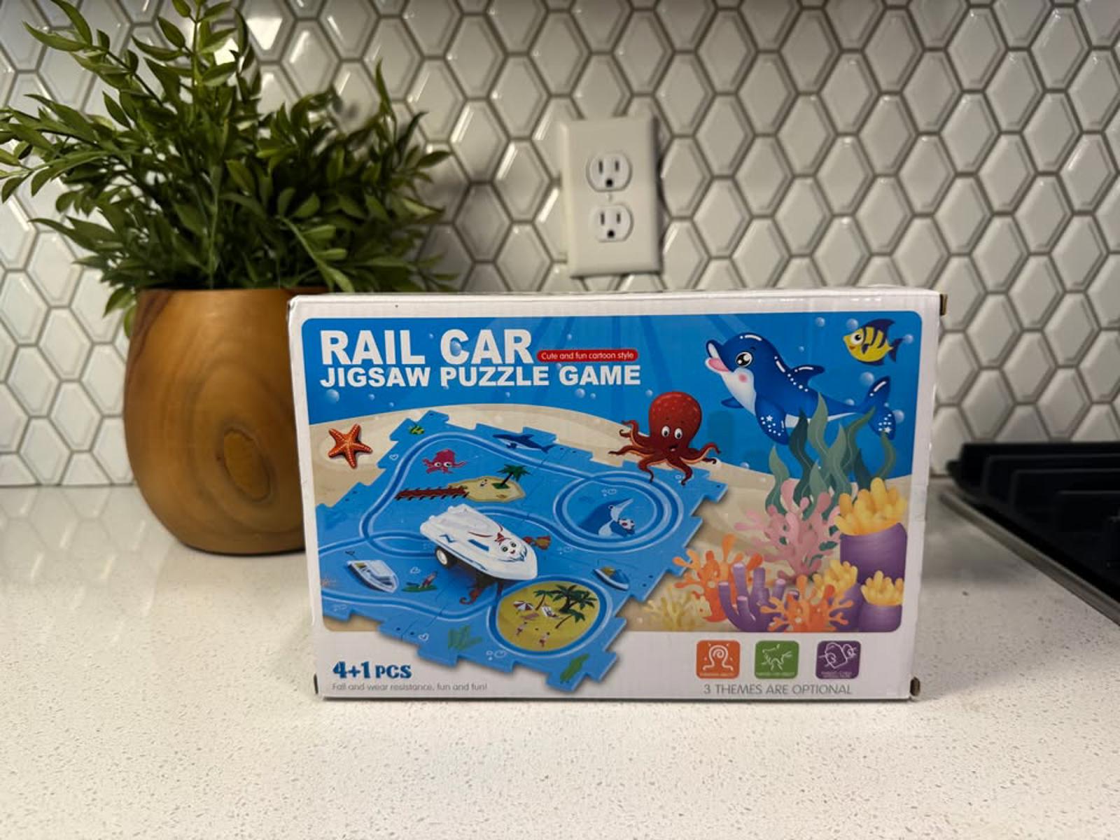 Rail Car Jigsaw Puzzle Game with Space and Ocean Themes
