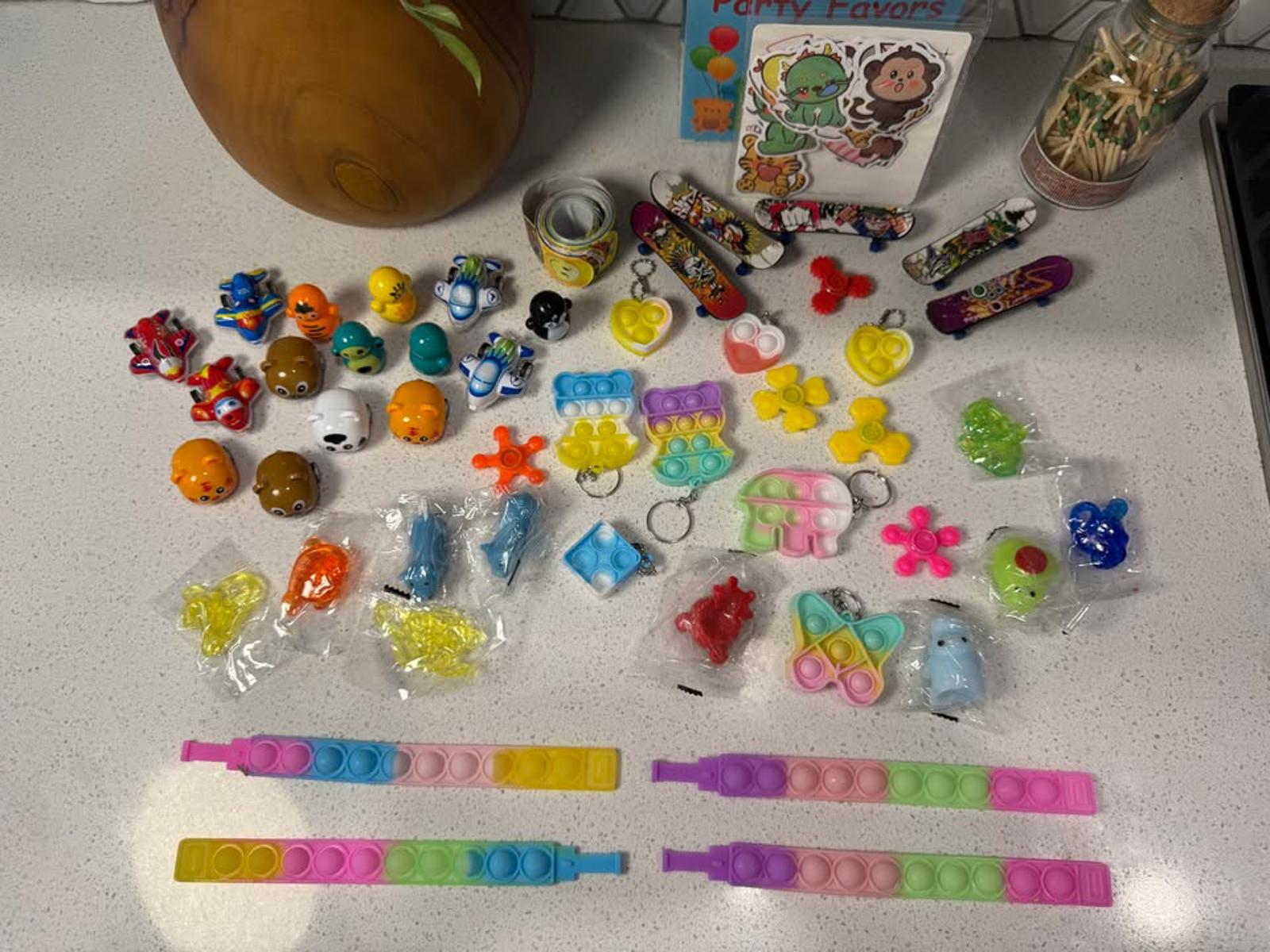 Kids Party Favors Toy Set with Assorted Mini Toys and Pop It Bracelets