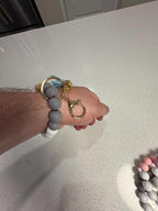 Set of Four Silicone Beaded Keychain Bracelets with Tassels